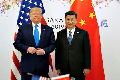 Donald Trump y Xi Jinping. Sus países consensuaron el acuerdo de "fase uno" en medio de la guerra comercial