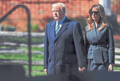 Trump y Melania en el funeral del evangelista Billy Graham