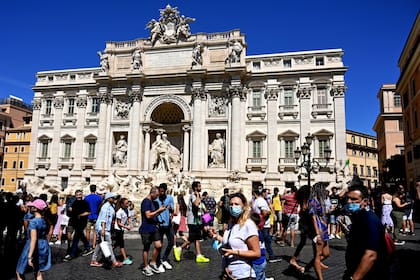 Turistas en la Fontana di Trivi, en Roma, el 19 de agosto pasado