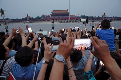 Turistas en la plaza de Tienanmen