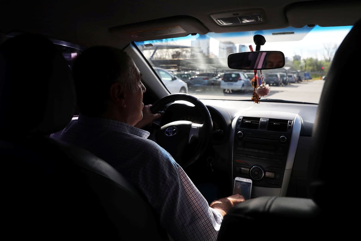 Uber driver Juan Carlos, who wished not to give his last name, drives his car in Buenos Aires, Argentina September 19, 2018. Picture taken September 19, 2018. REUTERS/Marcos Brindicci