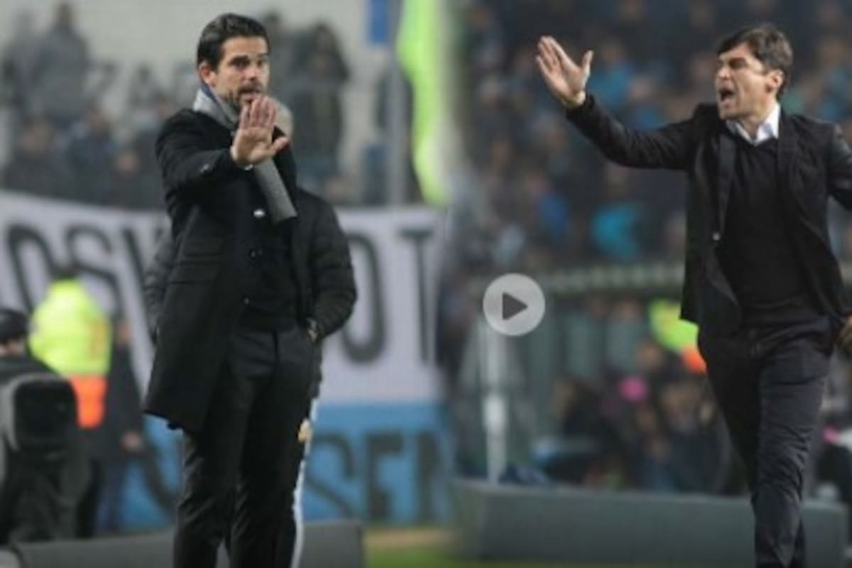 Un cruce de Gago y el Cacique Medina en medio del partido entre Racing y Vélez, en Avellaneda