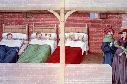 Un dormitorio medieval, según una ilustración de 1450.