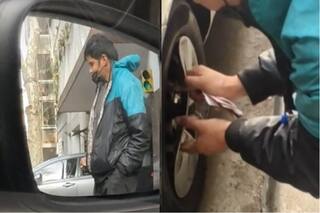 Estaba en su auto y grabó el momento en que un ladrón quiso robarle una rueda