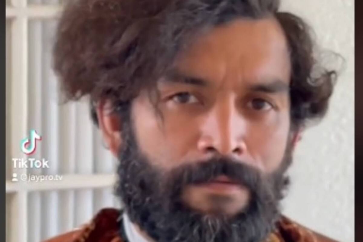 Un hombre sin techo necesitaba cortarse el pelo para recuperar a sus hijos y el peluquero lo convirtió en otra persona. Captura TikTok.