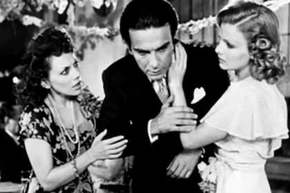 Una escena de Boquitas pintadas, de 1974, dirigida por Leopoldo Torre Nilsson, con Isabel Pisano, Alfredo Alcón y Marta González