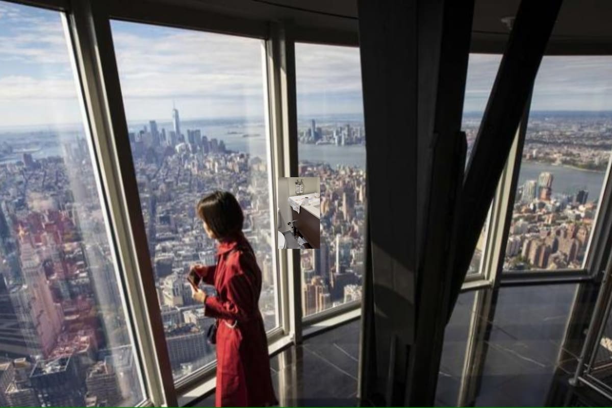 Una mujer desde el observatorio del piso 102 del Empire State Building (Imagen referencial/AFP)