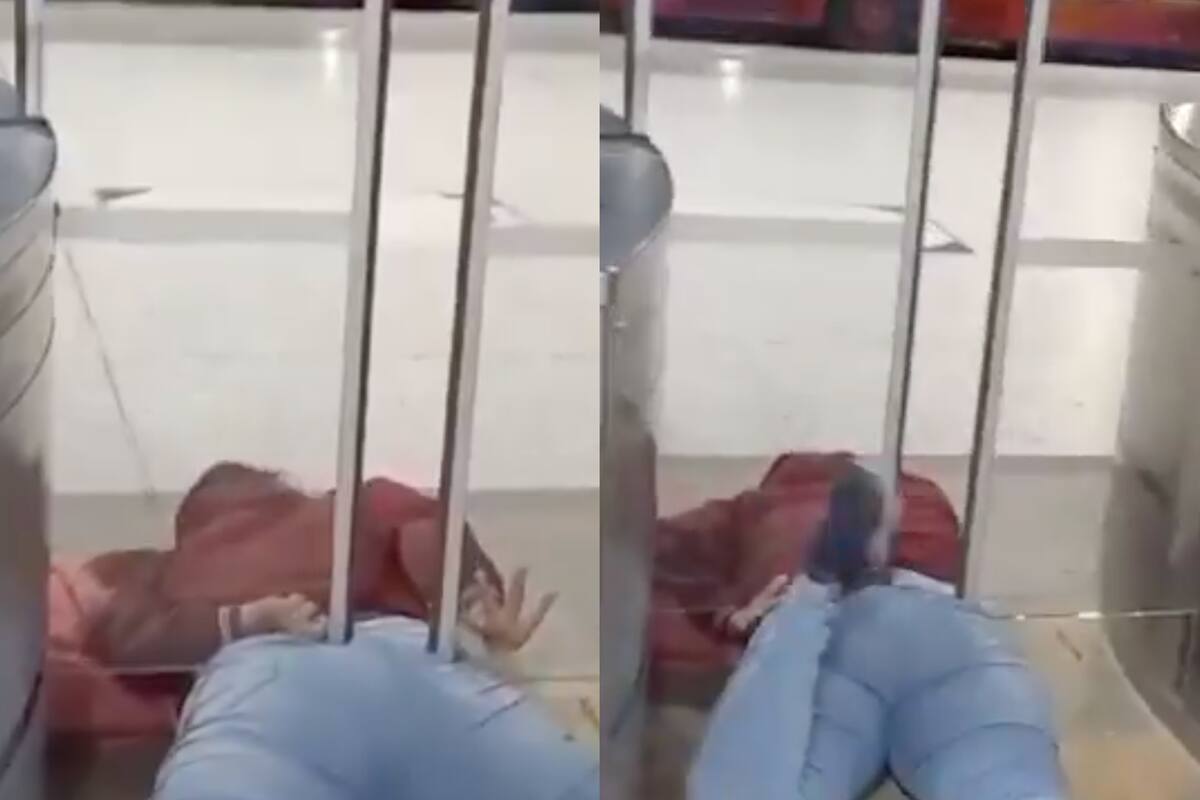 Una mujer intentó colarse en una estación de colectivos en Bogotá (Foto: captura de pantalla).