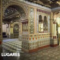 Un palacio con un genio alado en la cúpula y una réplica de la Alhambra en el subsuelo