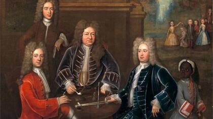 Una pintura británica del siglo XVIII de Elihu Yale (centro) en la que se lo ve con un niño esclavo