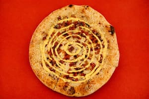 Una pizza inspirada en la carbonara en La Casa Blanca de Habana