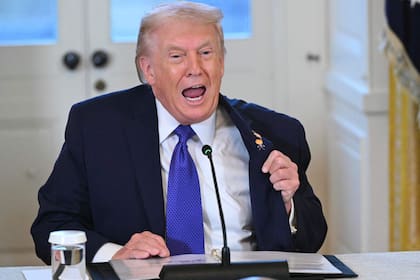 US President Donald Trump speaks during a meeting with US oil companies executives in the East Room of the White House in Washington, DC on January 9, 2026. President Trump is aiming to convince oil executives to support his plans in Venezuela, a country whose energy resources he says he expects to control for years to come. US forces seized Venezuelan president Nicolas Maduro in a sweeping military operation on January 3, with Trump making no secret that control of Venezuela's oil was at the heart of his actions. (Photo by SAUL LOEB / AFP)