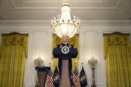 US President Joe Biden speaks about the Covid-19 response and the vaccination program in the East Room of the White House in Washington, DC, on August 18, 2021. (Photo by Jim WATSON / AFP