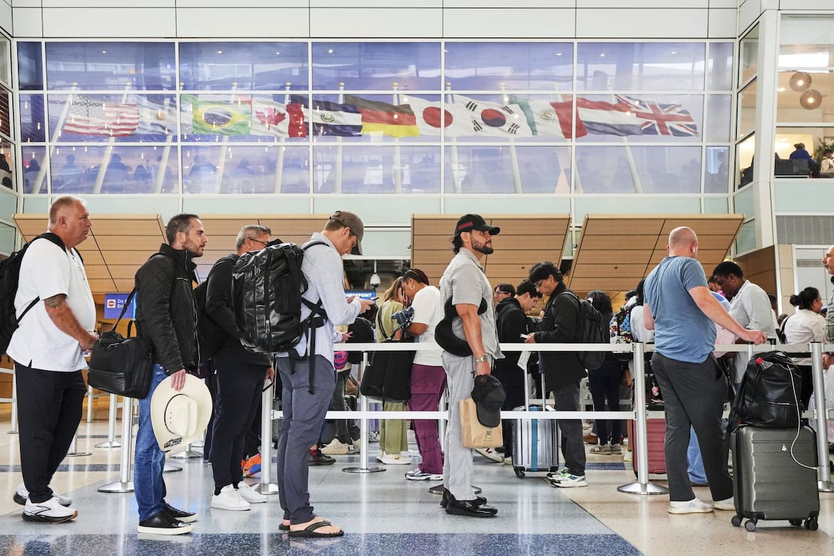 Viajeros en el aeropuerto de Dallas