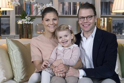 Victoria junto a su esposo Daniel y su hija