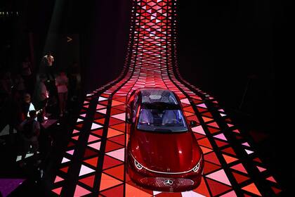Visitors watch the premiere presentation of the Mercedes Benz Concept CLA Class in the Open Space pavilion of Mercedes Benz during the International Motor Show IAA in Munich, southern Germany, on September 6, 2023. Germany's IAA MOBILITY auto show, one of the world's largest, will be open for the public from September 5 to 10, 2023 and showcase all car-related topics. (Photo by Christof STACHE / AFP)