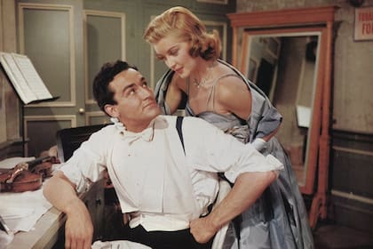 En Rhapsody, la película que lo unió con Elizabeth Taylor y con Shelley Winters, con quien se encontraba casado desde 1952