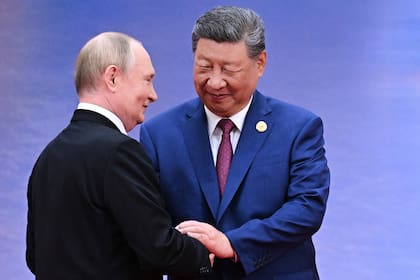 Vladimir Putin en uno de sus frecuentes encuentros con Xi Jinping, a quien visita todos los años