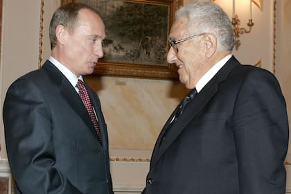 Vladimir Putin y Henry Kissinger, en 2005