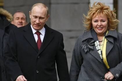 Vladimir Putin junto a su exesposa en 2014