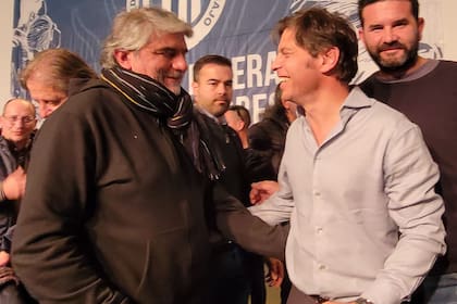 Walter Correa, ministro de Trabajo bonaerense, y el gobernador Axel Kicillof