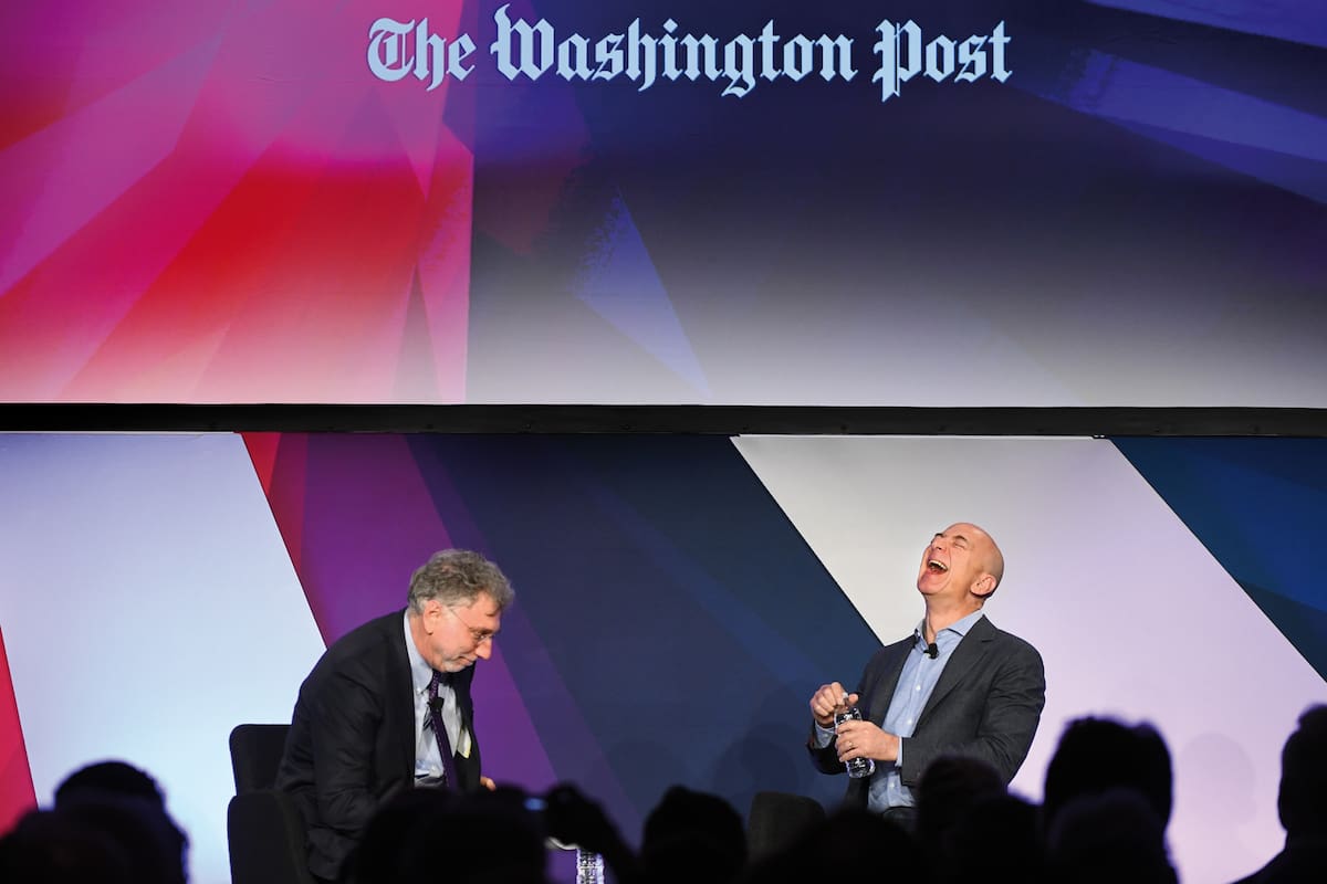WASHINGTON, DC - MAY 18: Amazon founder and owner of The Washington Post via Getty Images Jeff Bezos (R) is interviewed by Post Editor Martin Baron in Washington, DC on May 18, 2016. It was all part of The Washington Post via Getty Images's Transformers day long event featuring technological advances and business moves that are upending industries and changing lives. (Photo by Linda Davidson / The Washington Post via Getty Images)