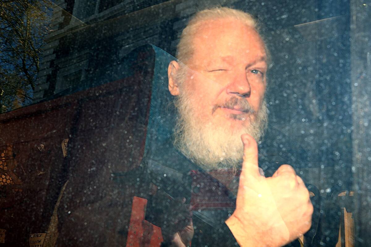 WikiLeaks founder Julian Assange arrives at the Westminster Magistrates Court, after he was arrested in London, Britain April 11, 2019