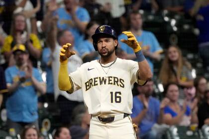 Woodruff brilla y Perkins impulsa cinco en victoria de Cerveceros 9-2 sobre Angelinos