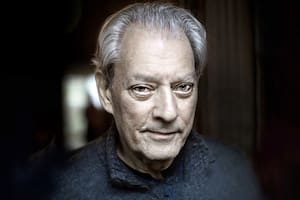 Writer Paul Auster at home in Brooklyn. They are both active in the Writers Against Trump movement.