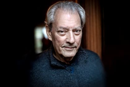 Writer Paul Auster at home in Brooklyn. They are both active in the Writers Against Trump movement.