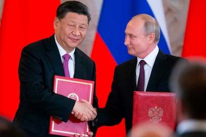 Xi Jinping y Vladimir Putin durante un encuentro en Moscú (archivo)