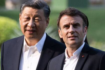 Xi y Macron durante la visita del presidente francés a China