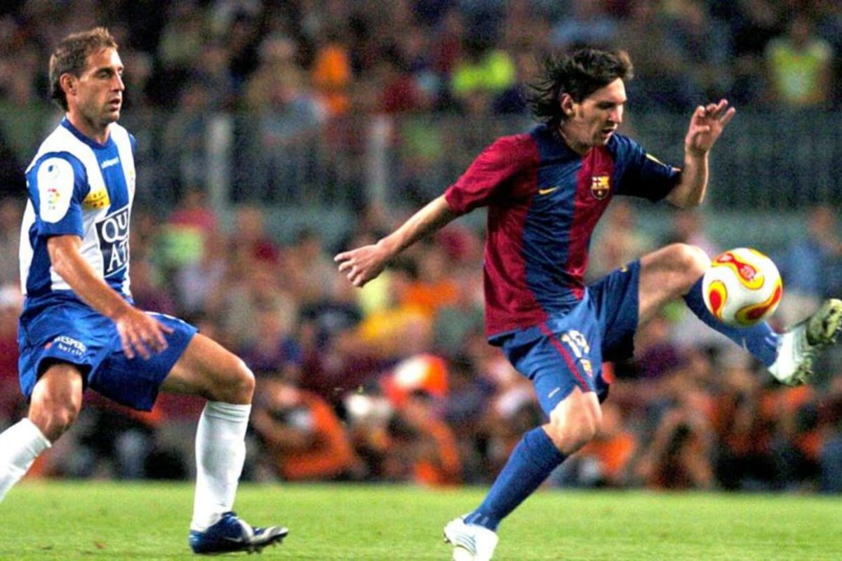 Zabaleta y Messi, jugando el clásico catalán entre Espanyol y Barcelona