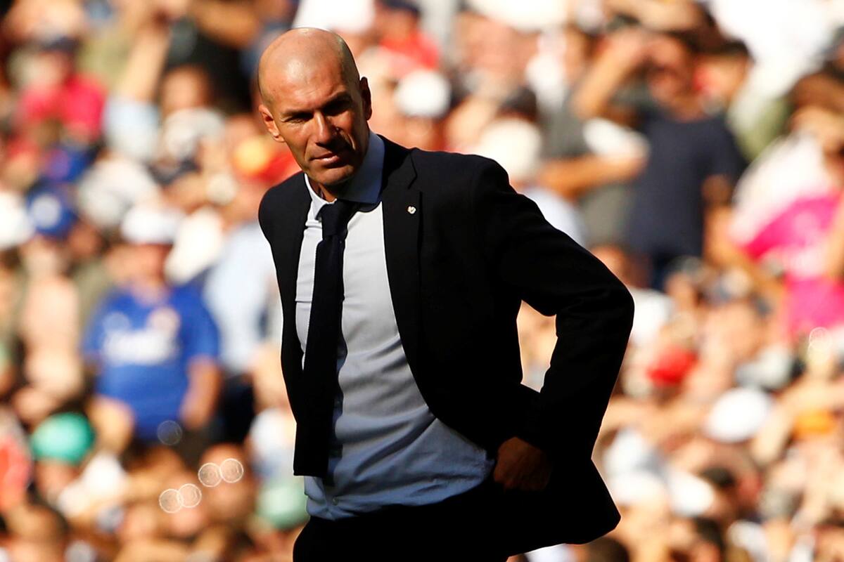 Zidane, entre la sombra y el sol, igual que su Real Madrid.
