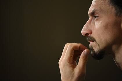 Sweden's forward Zlatan Ibrahimovic gestures as he addresses a press conference on March 22, 2021 in Stockholm, prior to the World Cup qualifier of Sweden vs Georgia to be played on March 25, 2021. - Zlatan Ibrahimovic returned to Sweden's squad after an almost five-year hiatus. (Photo by Jonathan NACKSTRAND / AFP)