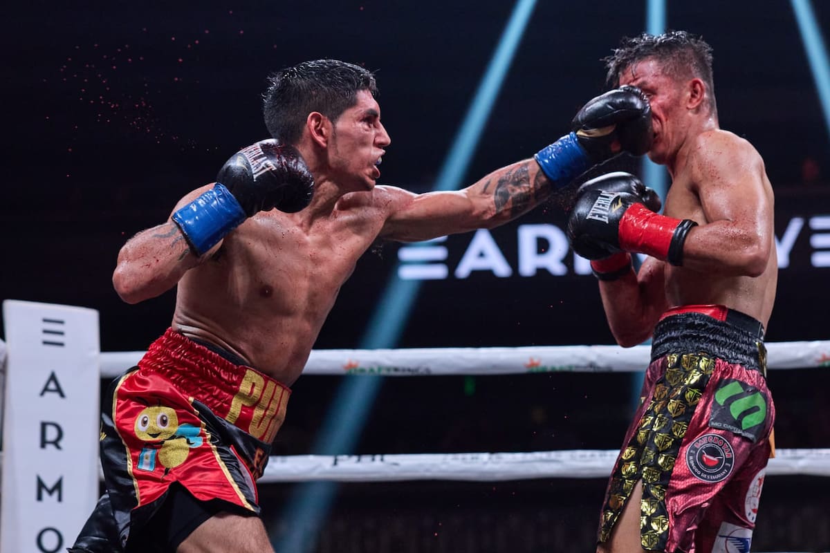 Zurdazo de Fernando "Puma" Martínez al rostro de Jade Bornea; en Minneapolis, el porteño fue claramente superior al filipino y le ganaba en las tarjetas antes del KOT en el round 11..
