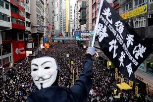 La manifestación a favor de la democracia, organizada por el Frente Civil de los Derechos Humanos, en Hong Kong